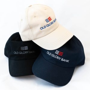 Old Glory Bank hat available in navy, white, and black colors